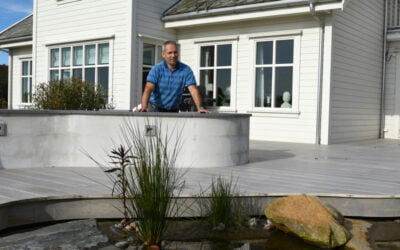 Betongmur som svinger seg